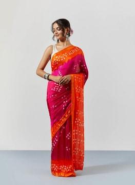 women bandhani print saree with contrast lace border