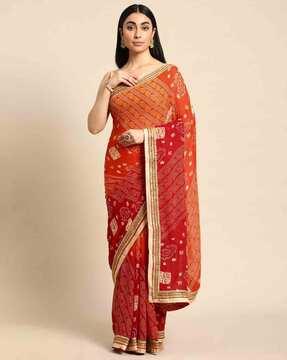 women bandhani print saree with lace border