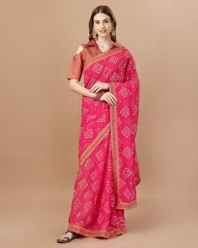 women bandhani print saree with tassels