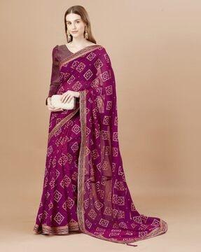 women bandhani print saree with tassels