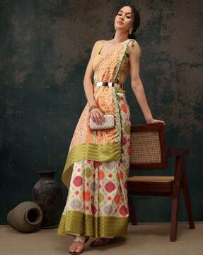 women bandhani print saree with tassels