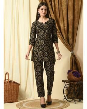 women bandhani print straight kurta set