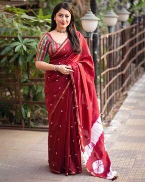 women bandhej print saree with contrast border