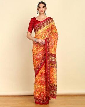 women bandhnai print saree with contrast border