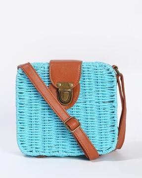 women basket weave sling bag with adjustable strap