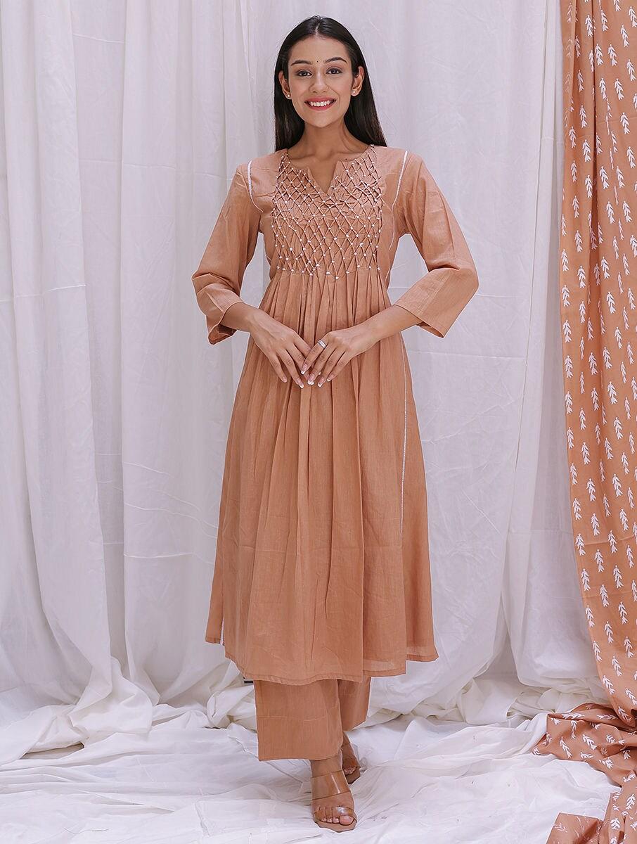 women beige brown cotton block print round neck a line kurta with pants