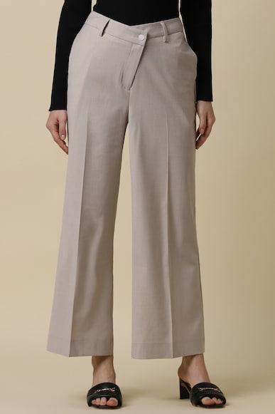 women beige regular fit textured formal trousers