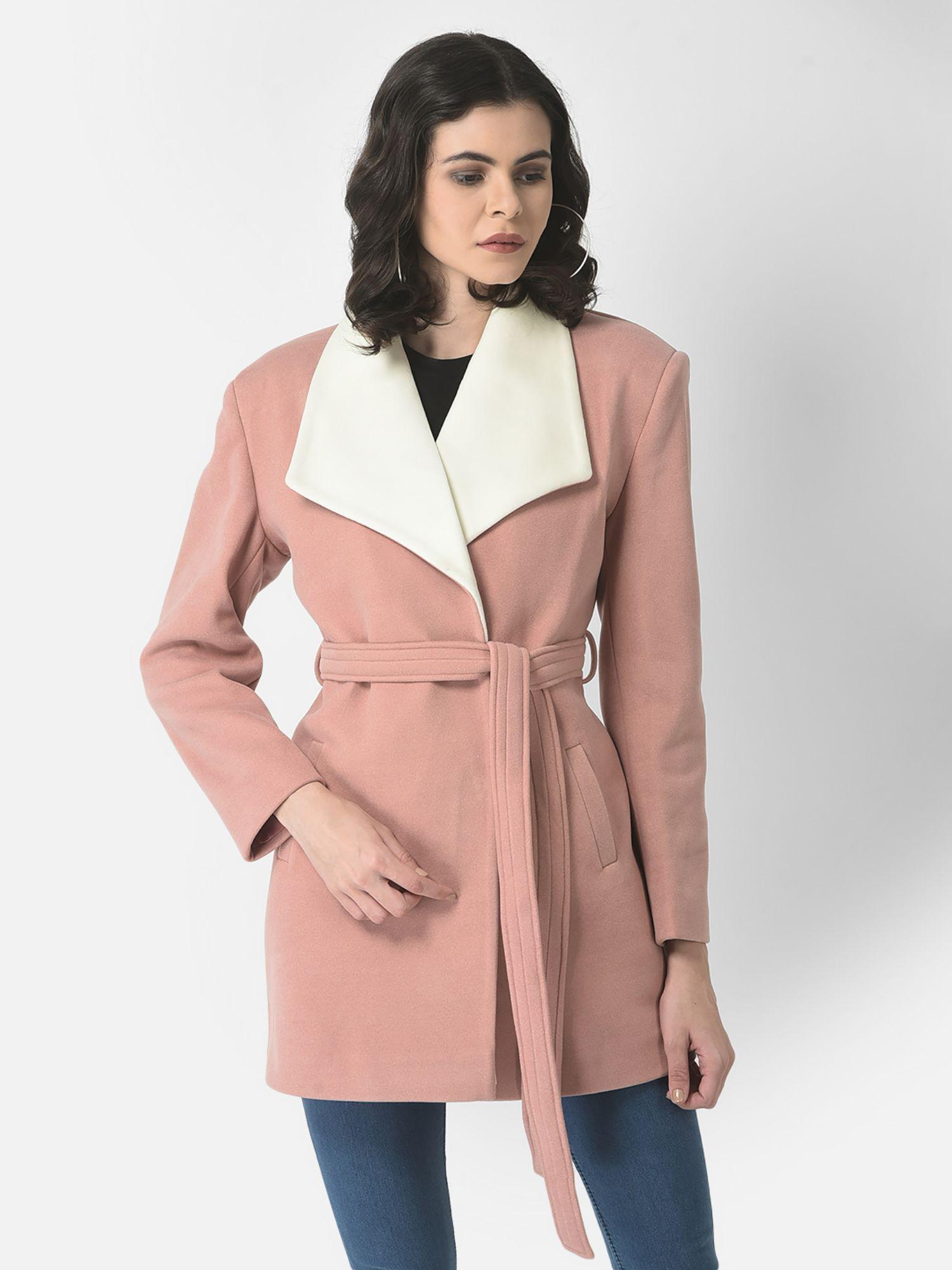 women belted pink overcoat