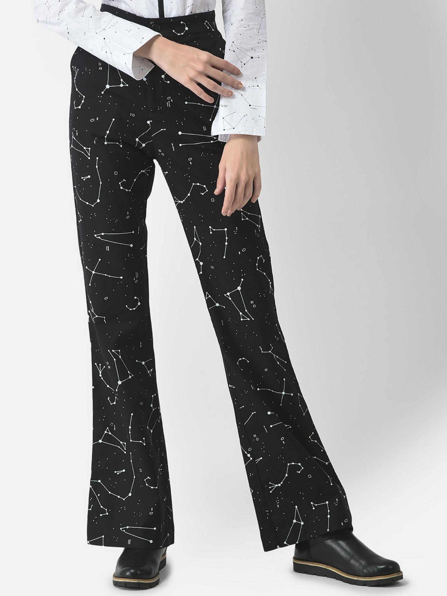 women black constellation print trousers