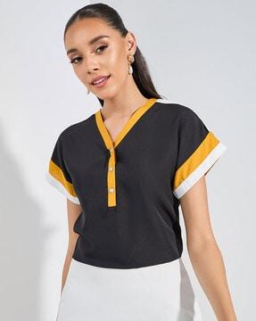 women black extended sleeve varsity v-neck top