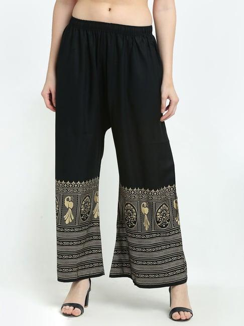 women black gold foil print flared palazzo with fully elasticated waistband and drawstrings at the side along slip on closure.