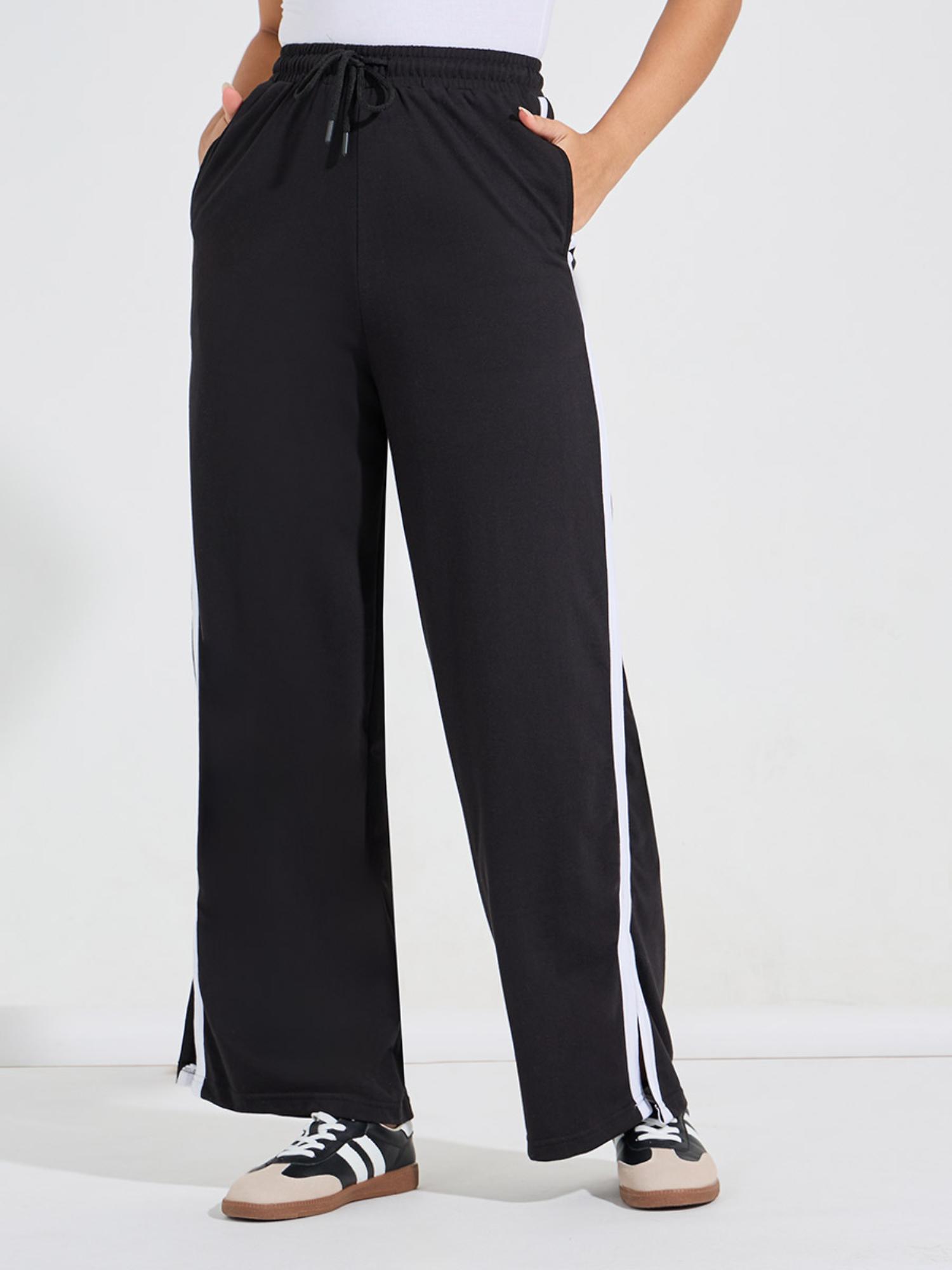 women black solid high waist pants with side stripes