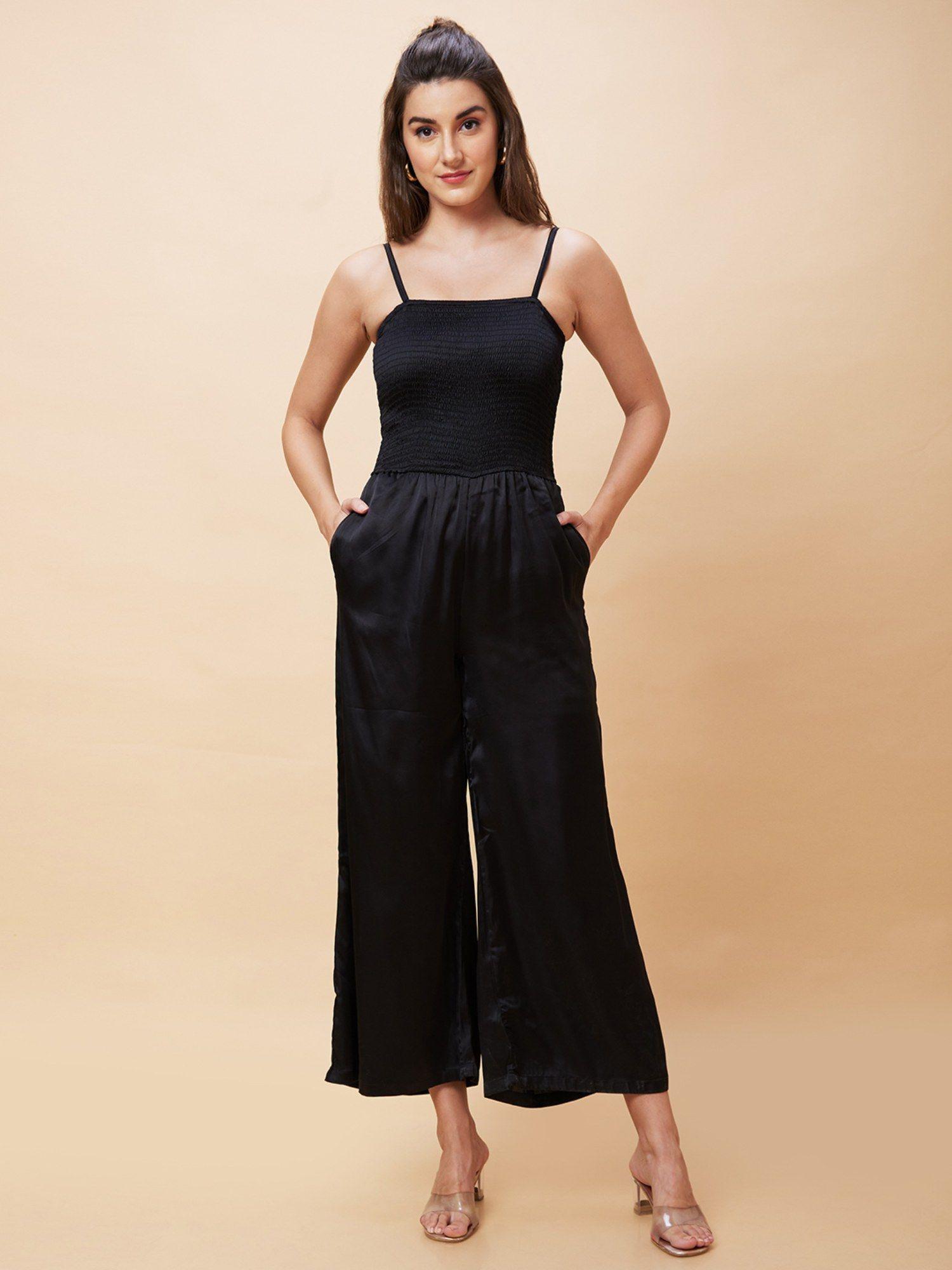 women black solid smocked strappy party jumpsuit