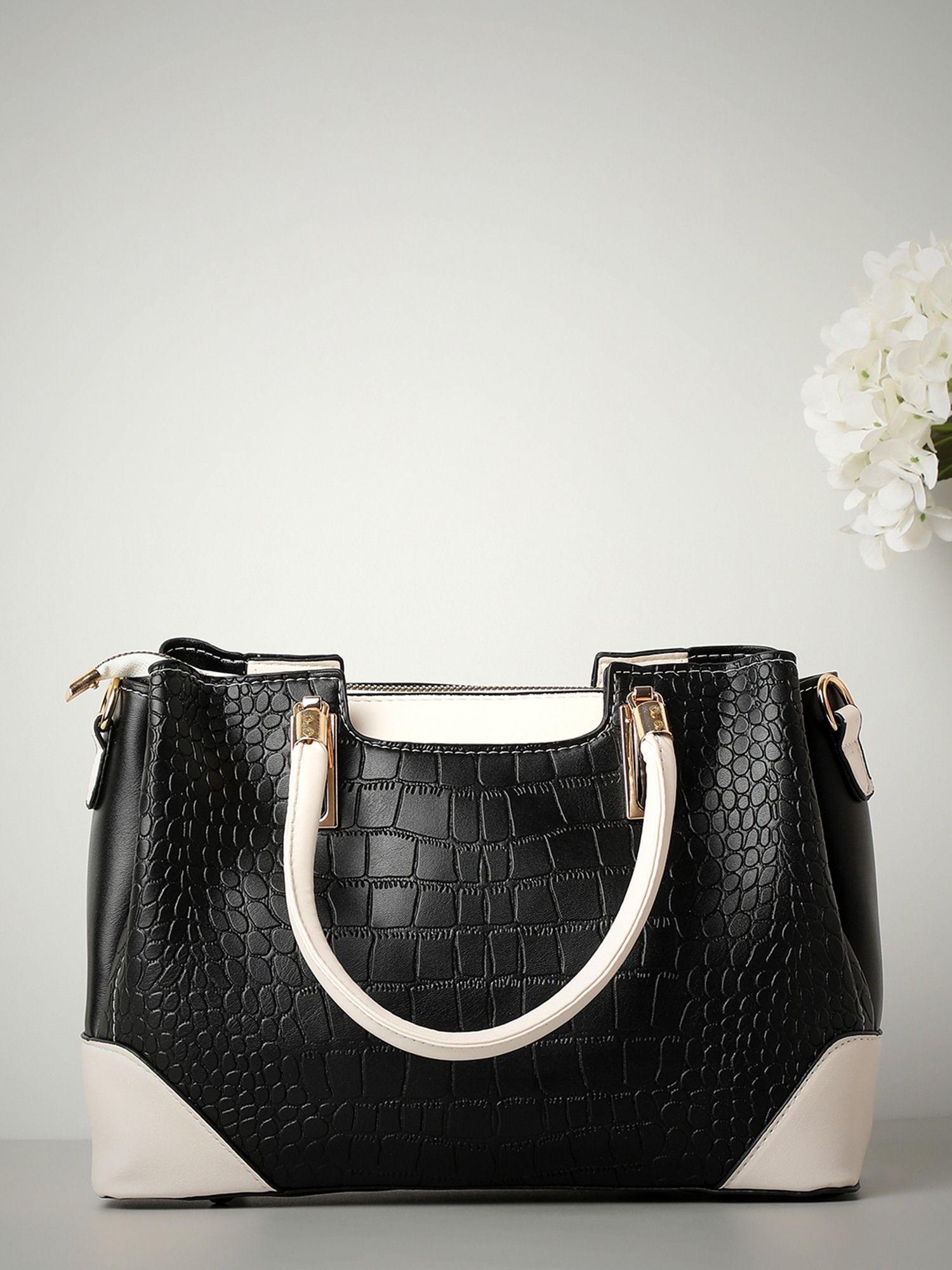 women black white textured handheld bag