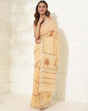 women block print saree with contrast border