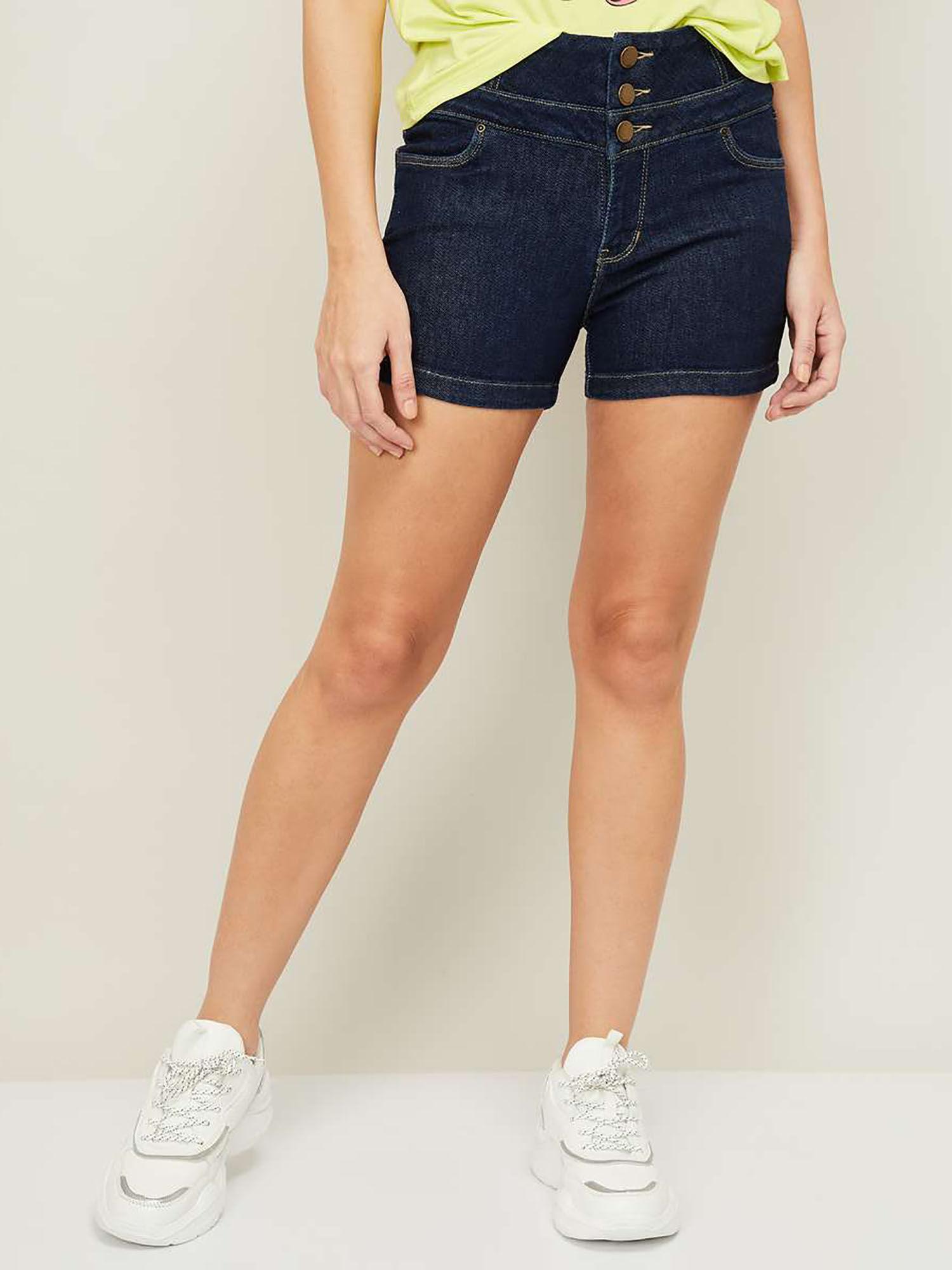 women blue high rise denim shorts