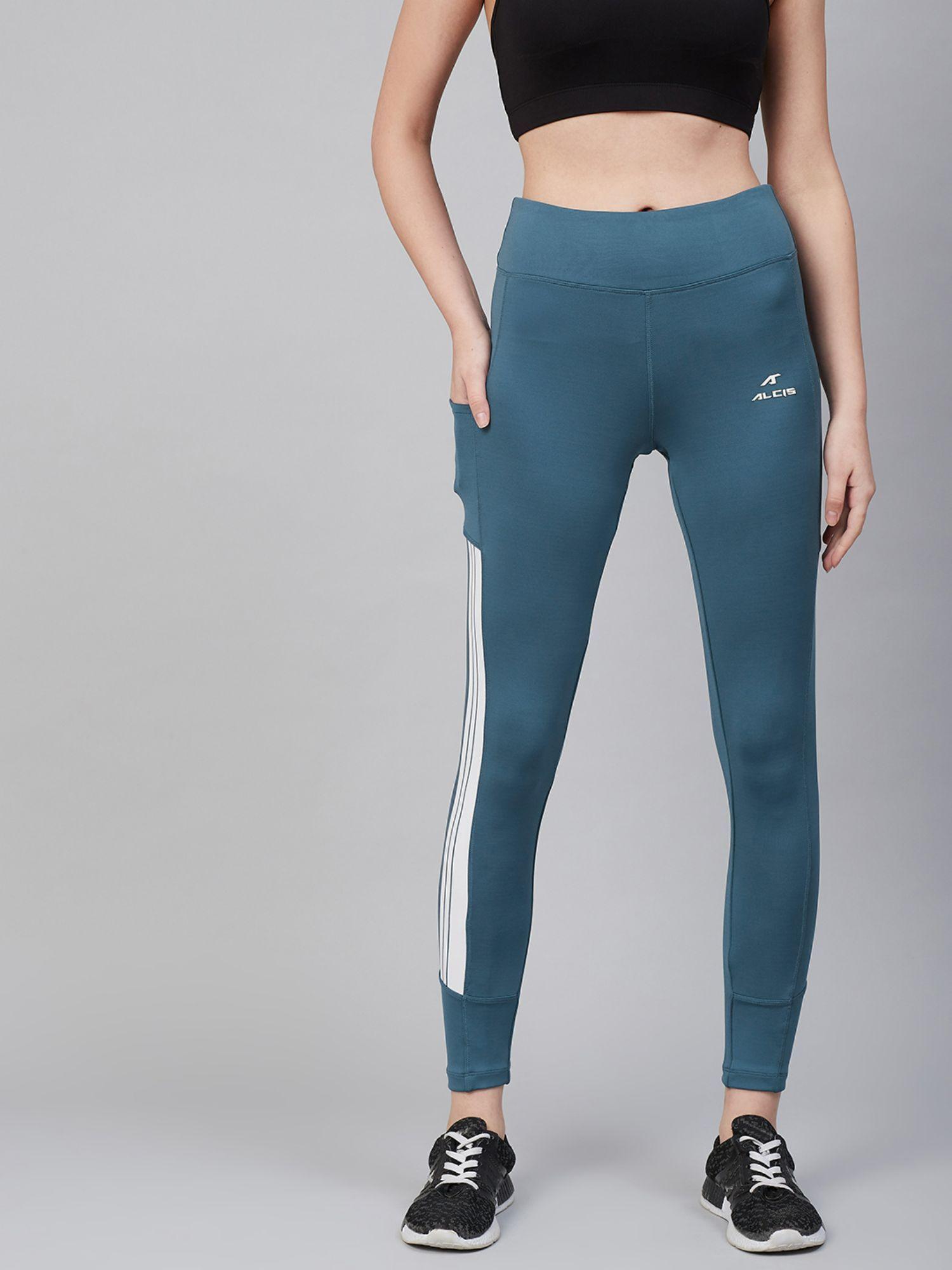 women blue solid training tights