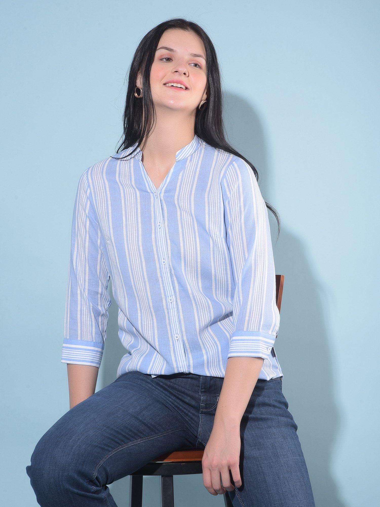 women blue vertical striped shirt