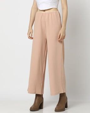 women boot fit pleat-front trousers