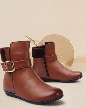 women boots with buckle closure