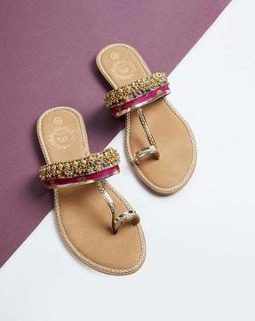 women braided toe-ring flat sandals