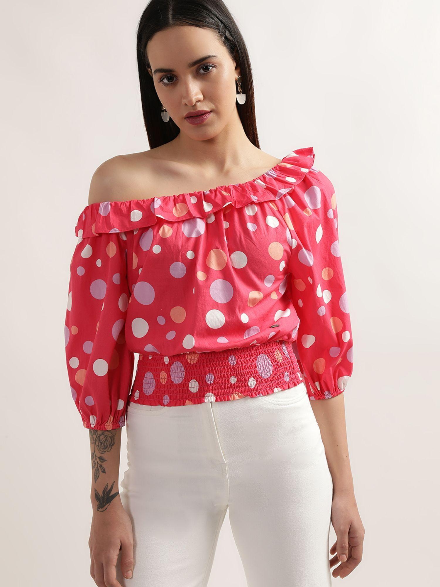 women bright pink polka dot top