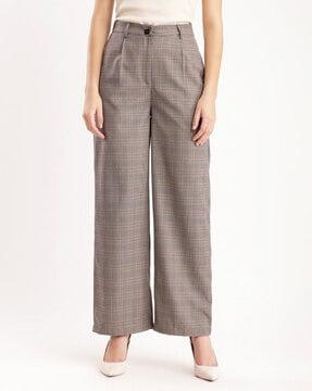 women checked flared pleat-front pants