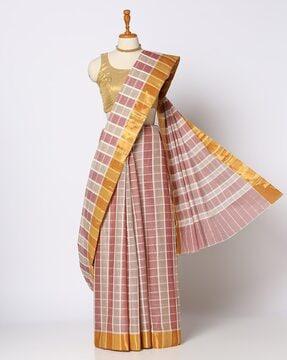 women checked ikat kanchi saree