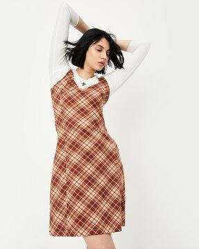 women checked pinafore dress with t-shirt