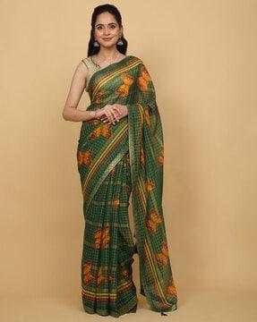 women checked poly silk saree with tassels