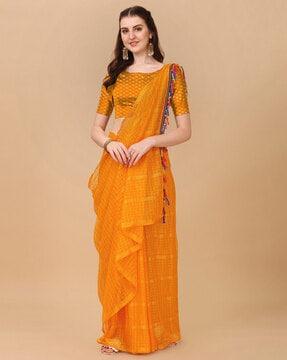 women checked saree with tassels