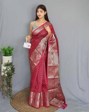 women checked saree with tassels