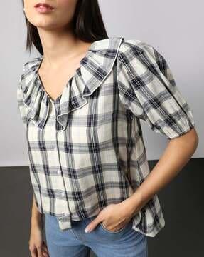 women checked shirt with ruffle overlay