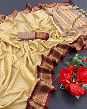 women checked silk saree with tassels