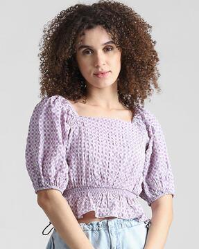 women checked top with smocked waist