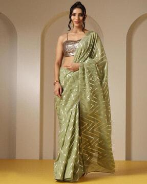 women chevron pattern embellished saree