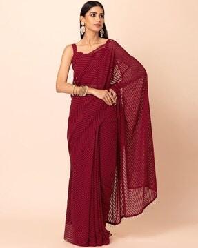 women chevron saree with tassels