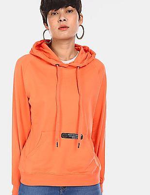 women coral raglan sleeve solid hooded sweatshirt