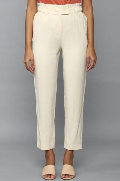 women cream regular fit solid casual trousers