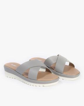 women criss-cross strap slip-on sandals