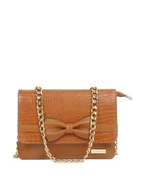 women croc-embossed sling bag with magnetic closure