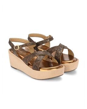 women croc-embossed wedges with buckle fastening