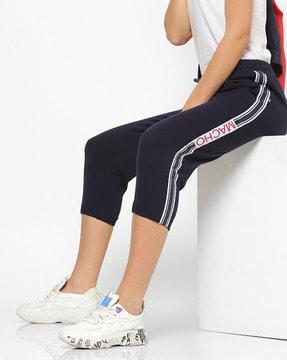 women cropped fitted track pants with side taping