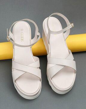 women cross-strap sandals with buckle closure
