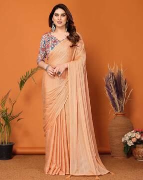 women crushed saree with tassels