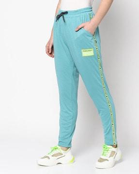 women drawstring track pants with contrast taping