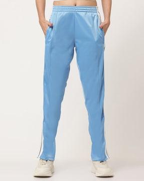 women elasticated track pants with flared bottoms