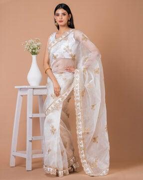 women embellished & embroidered saree