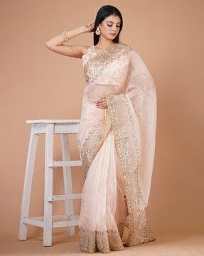 women embellished & embroidered saree