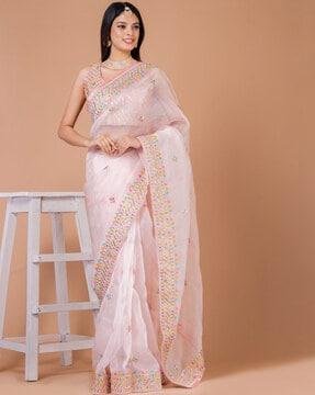 women embellished & embroidered saree